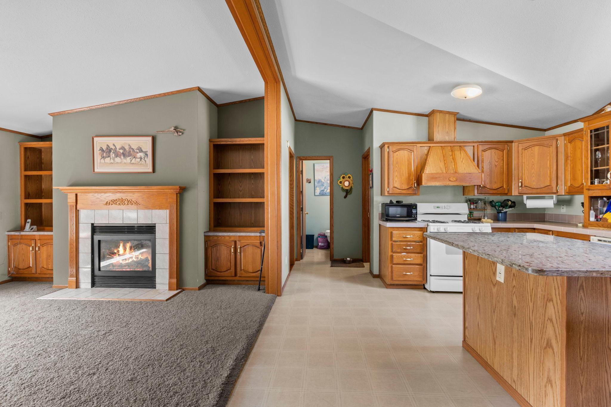 The family room and spacious kitchen are a great space for entertaining or gathering