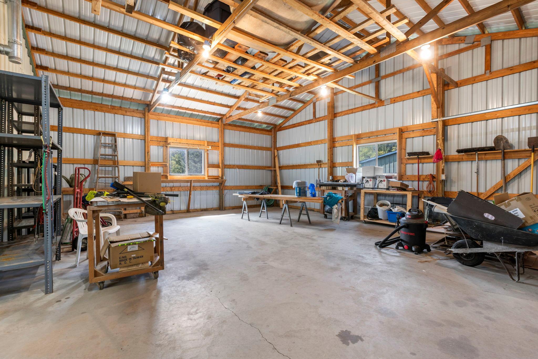 The cold storage area, still with concrete floors. The shelving will stay with the property