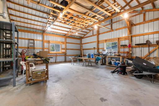 The cold storage area, still with concrete floors. The shelving will stay with the property