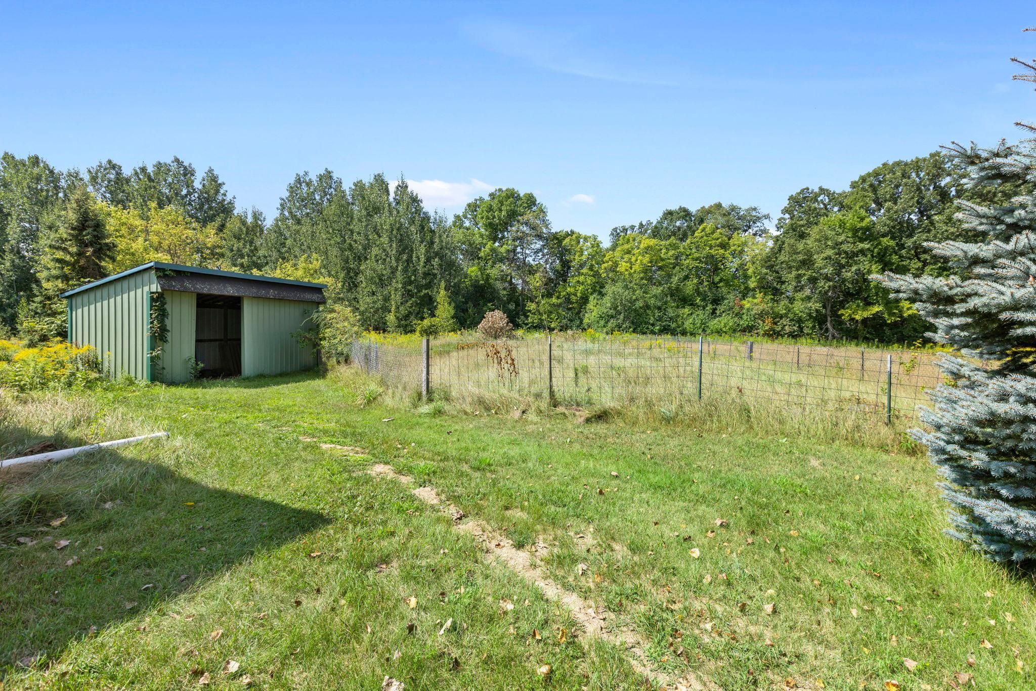 Next to the pole building is the loafing shed, the seller also used it for hay storage