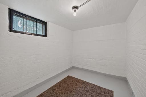 This basement room would make a great storage room or wine cellar
