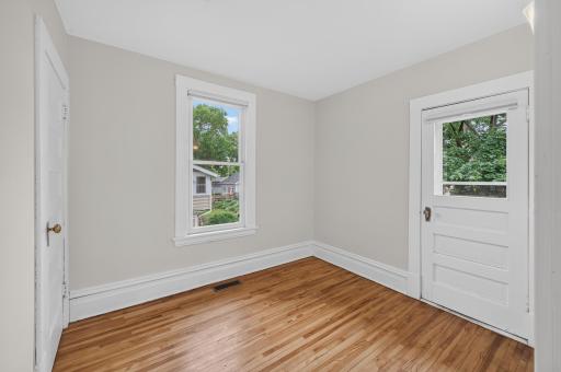 Bedroom 4 without staging. The door goes to a balcony!