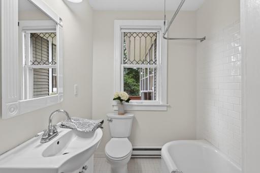 2nd floor full bath. Notice the leaded glass detail