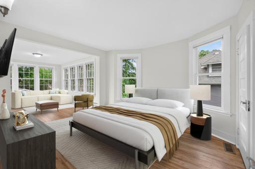 Primary Bedroom is AMAZING! There is a bedroom area plus seating or office area. Virtual staging