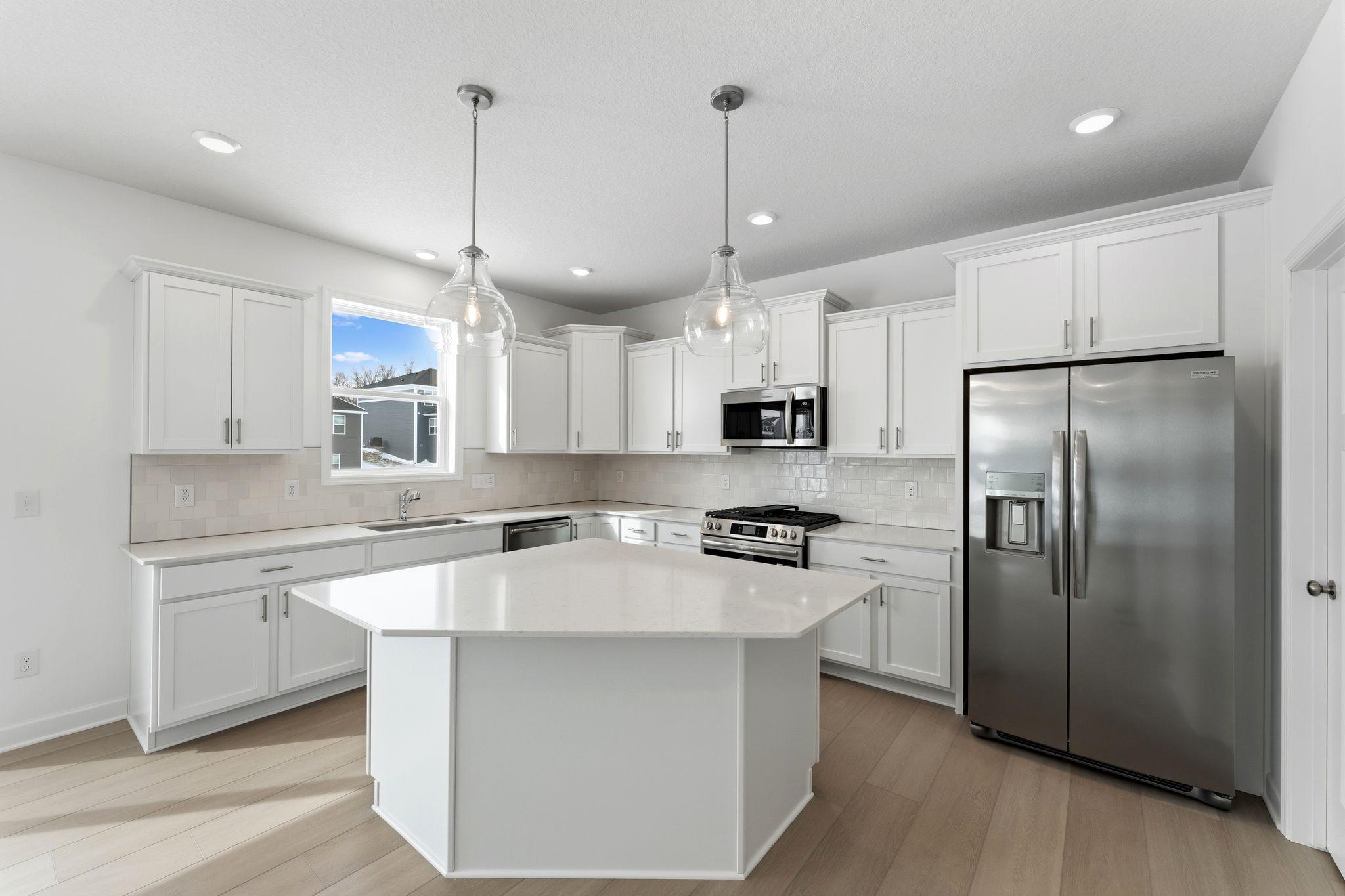 (All the following photos are of a similar home, actual finishes may vary.)