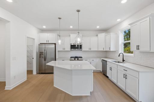 The kitchen naturally operates as the heart of this home, offering ample countertop space and brand-new appliances that will inspire attempts at new recipes.