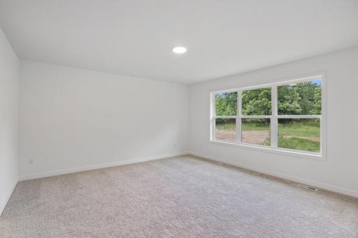 The ownerâs suite is found on the second floor, complete with a cozy bedroom, an en-suite bathroom and a walk-in closet.