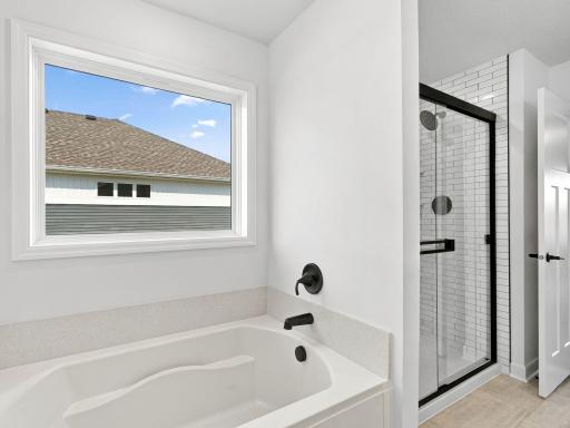 The soaking tub provides a spa-like experience