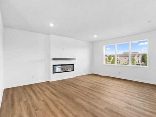 Curl up with a good book or enjoy family movie nights in the spacious yet cozy Great Room.