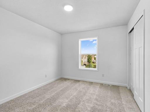 The secondary bedrooms offer comfort and privacy.
