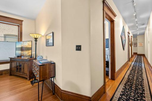 This is a classic Pullman style condo. Down the hall you'll find two bedrooms, 2 baths, kitchen and dining.