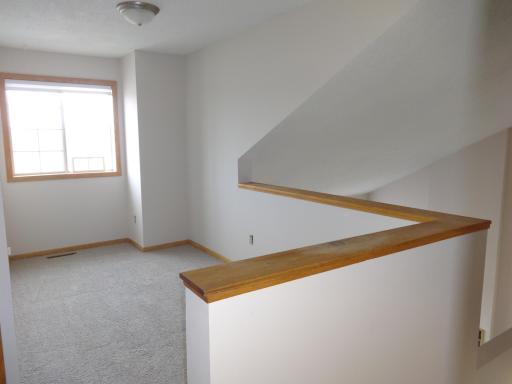 7 - Upper level loft overlooking family room.JPG