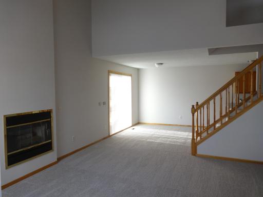 2 - Enter into the spacious main floor 2 story family room.JPG