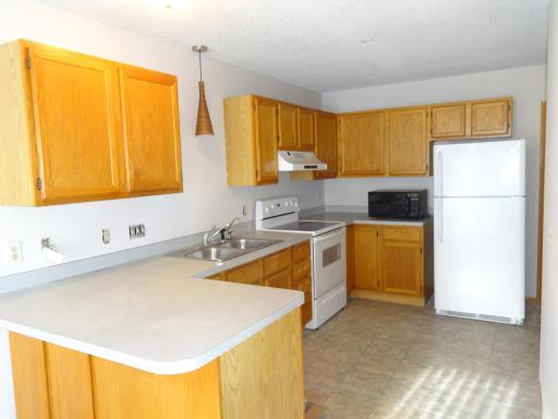 5 - Plenty of cooking and storage space in this kitchen.JPG