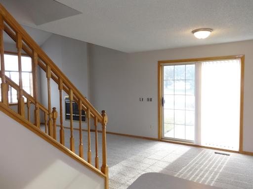 3 - Large dining area with sliding door to patio.JPG