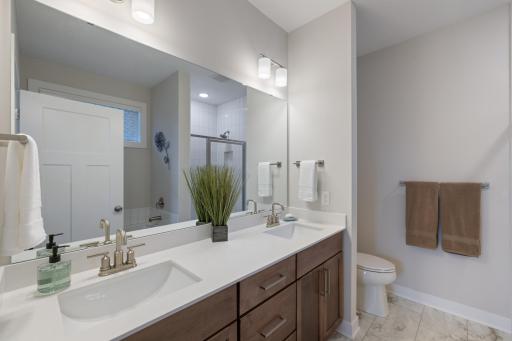 Spa like primary bathroom with seperate tub and shower.