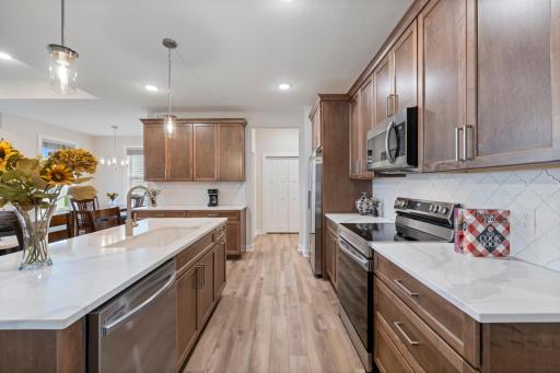 Enjoy Energy Star stainless steel appliances a pantry and coffee bar in this sleek kitchen.