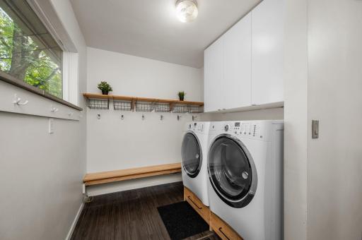 Keep things organized in this mud room / laundry area conveniently located just inside the back door