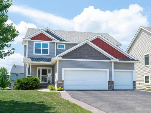 Welcome home to this stunning two-story featuring attractive multi-tone siding, a spacious three-car garage, and beautifully maintained landscaping.