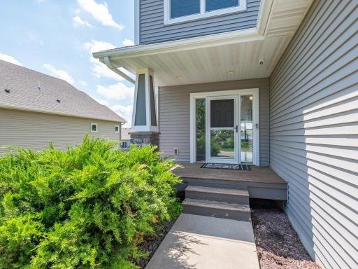 Inviting covered front entry.