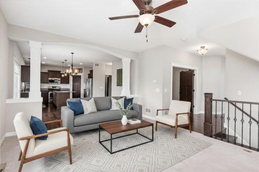 Virtually staged living/dining/kitchen area.