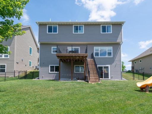 Rear exterior showcasing the home's walkout lower level.