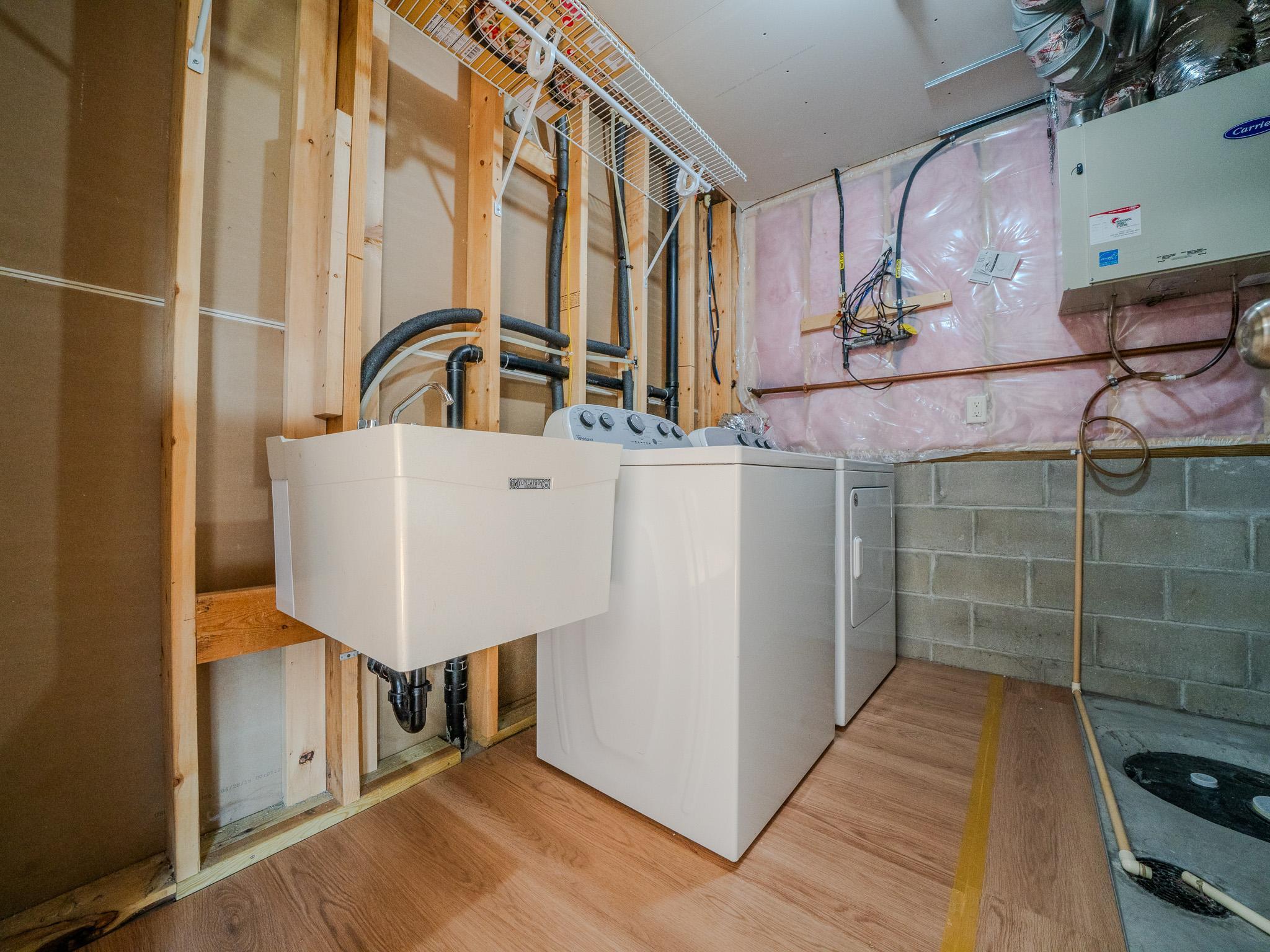 Washer and dryer with sink