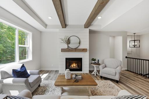 Upgraded gas fireplace with shiplap to ceiling