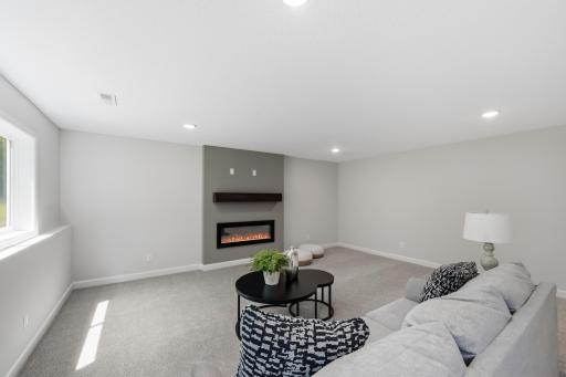 Lower level electric fireplace