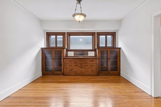Upper; Original dining room built in buffet and bookcases