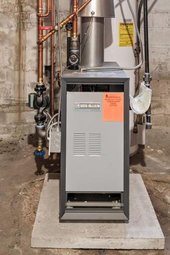 Beautiful new in 2025 Weil-Mclain Boiler. Both replaced.
