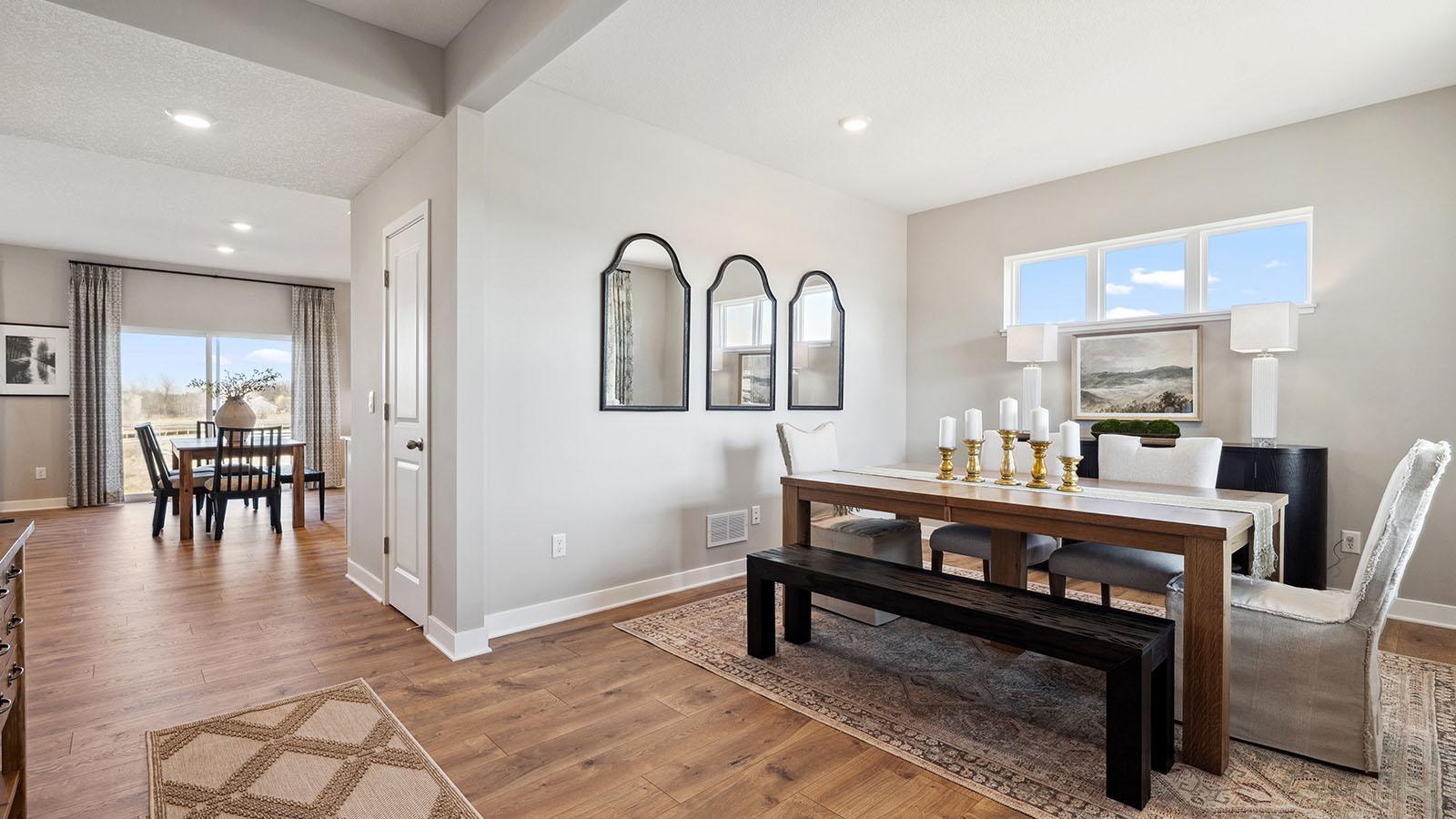 Another view of the front flex room. Note the transom window providing ample natural light. Photo of model home, colors and finishes may vary.