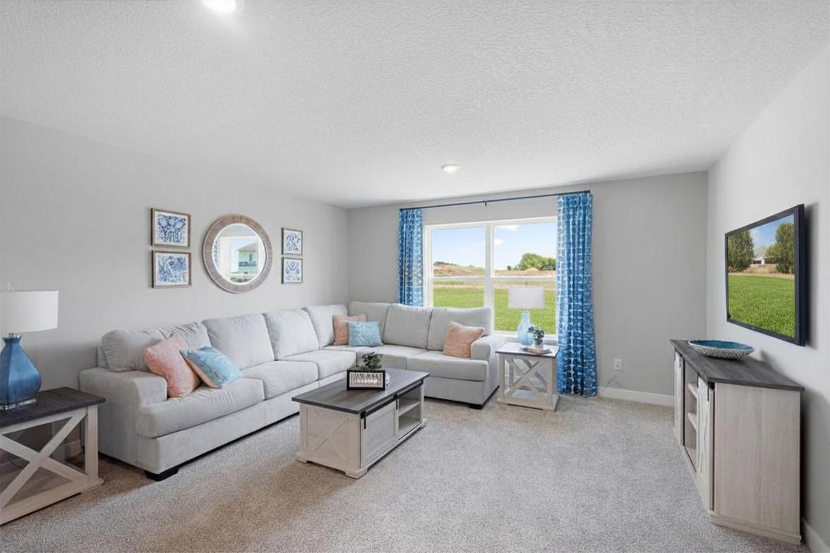 The large upper level loft provides a great second living space for entertainment and relaxation. Photo of model, colors and finishes may vary.