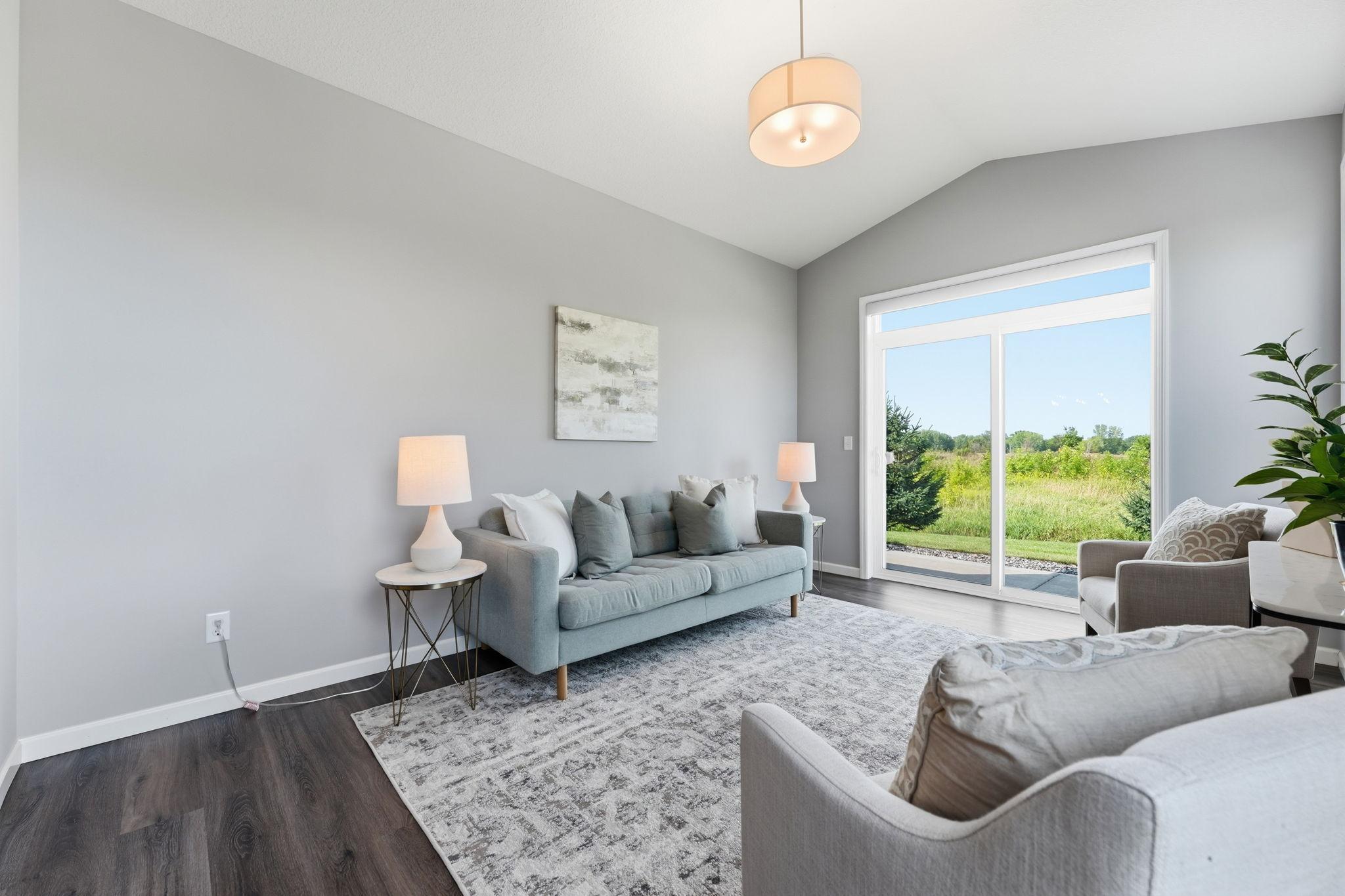 Gorgeous sunroom that walks out to 2 patios and great privacy.