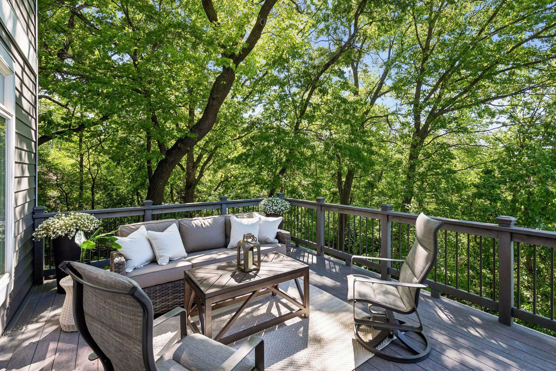 Peaceful maintenance-free deck just off the dinette with beautiful views of the lake and surrounding nature.