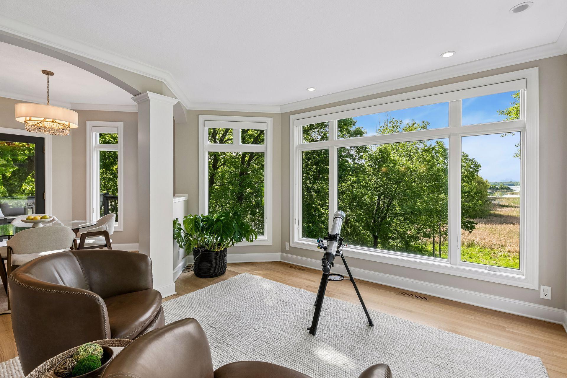 Winter, spring, summer, or fall, this favorite room offers windows for days, stunning lake views, endless bird watching, and starry nights you'll never forget.