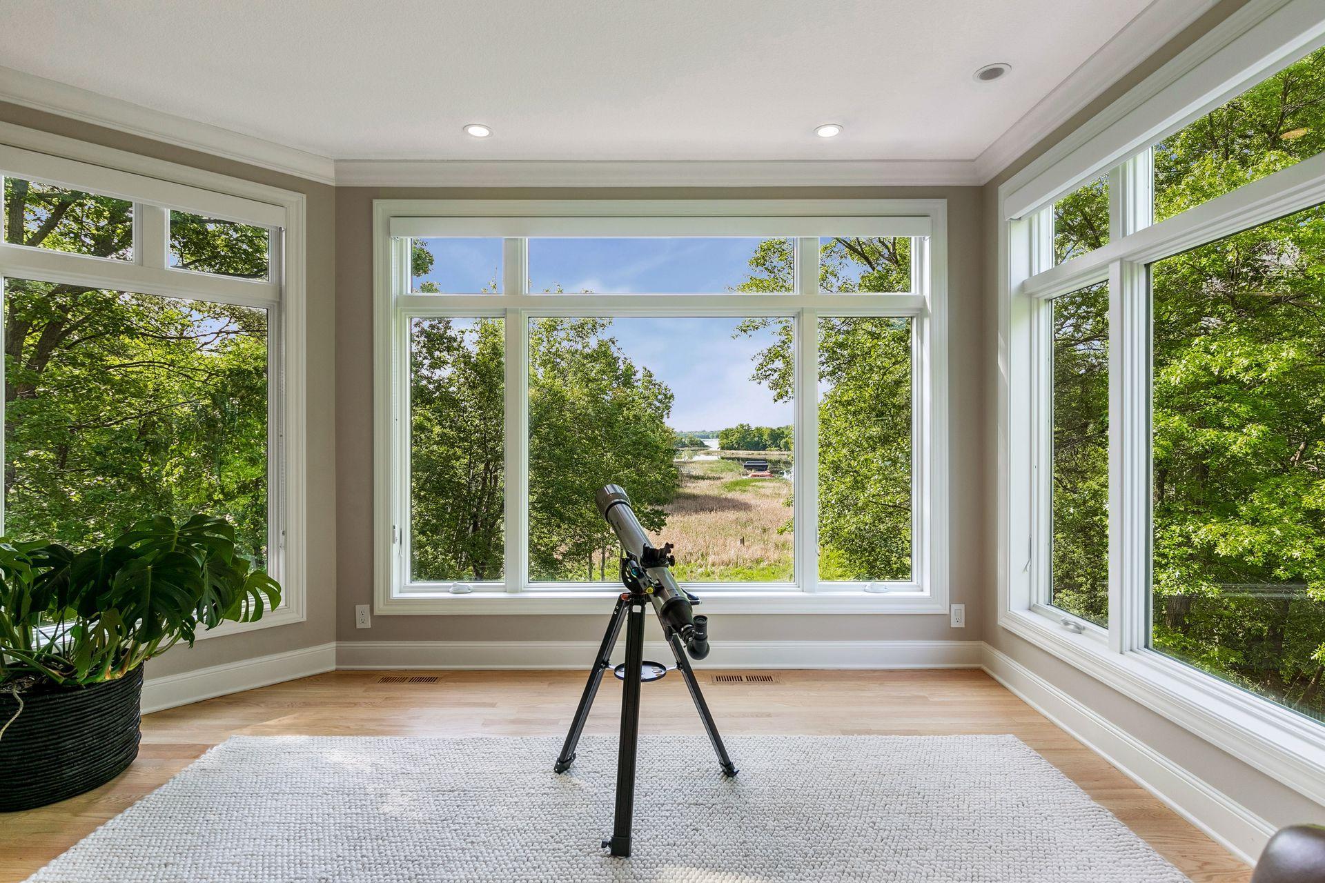 Winter, spring, summer, or fall, this favorite room offers windows for days, stunning lake views, endless bird watching, and starry nights you'll never forget.
