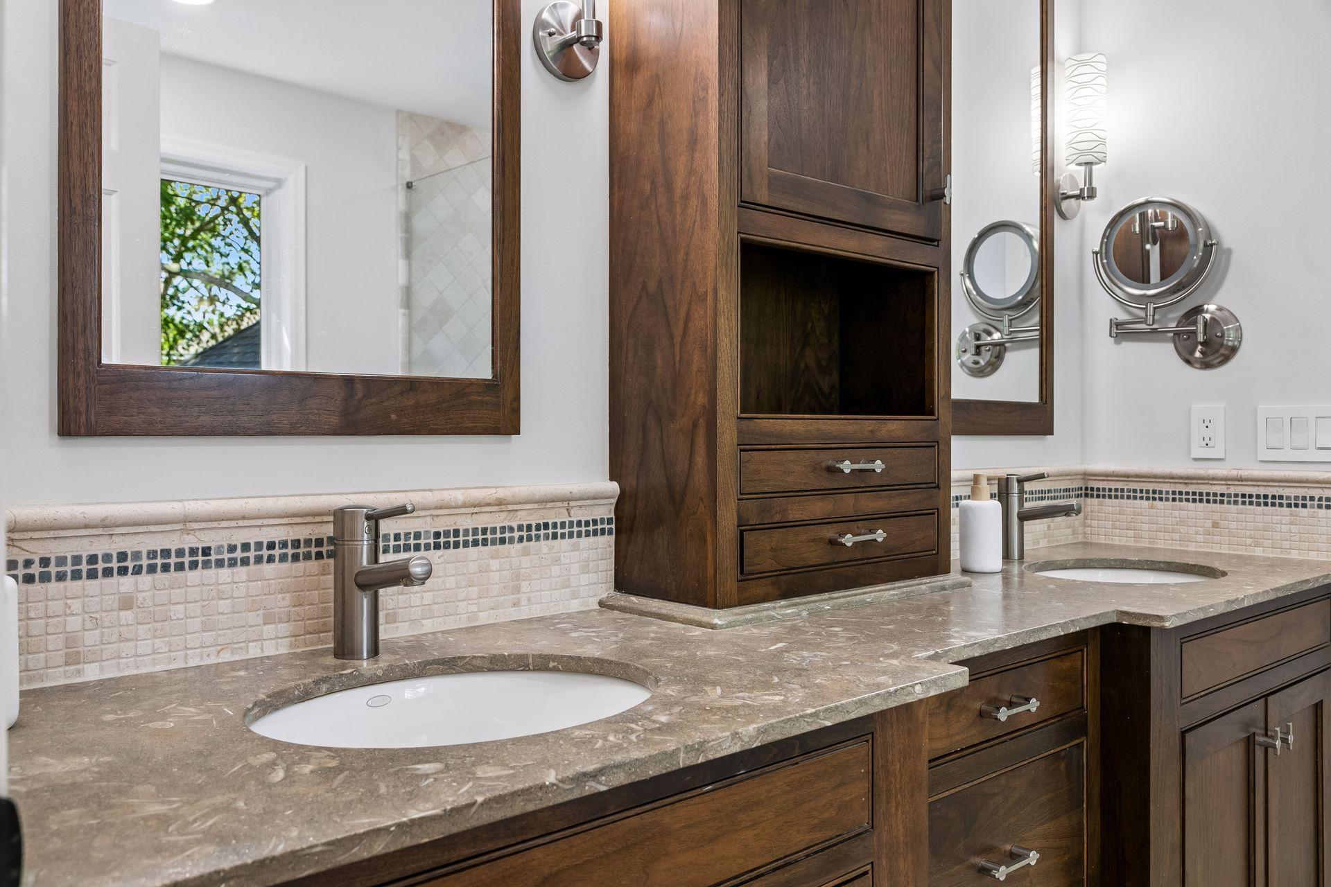 This primary suite is exceptional, featuring a spacious bedroom, a cozy reading nook, and a warm, spa-like bath with a separate tub and shower. Step out onto the private maintenance-free balcony and take in sweeping views of the 1+ acre lot and Lake