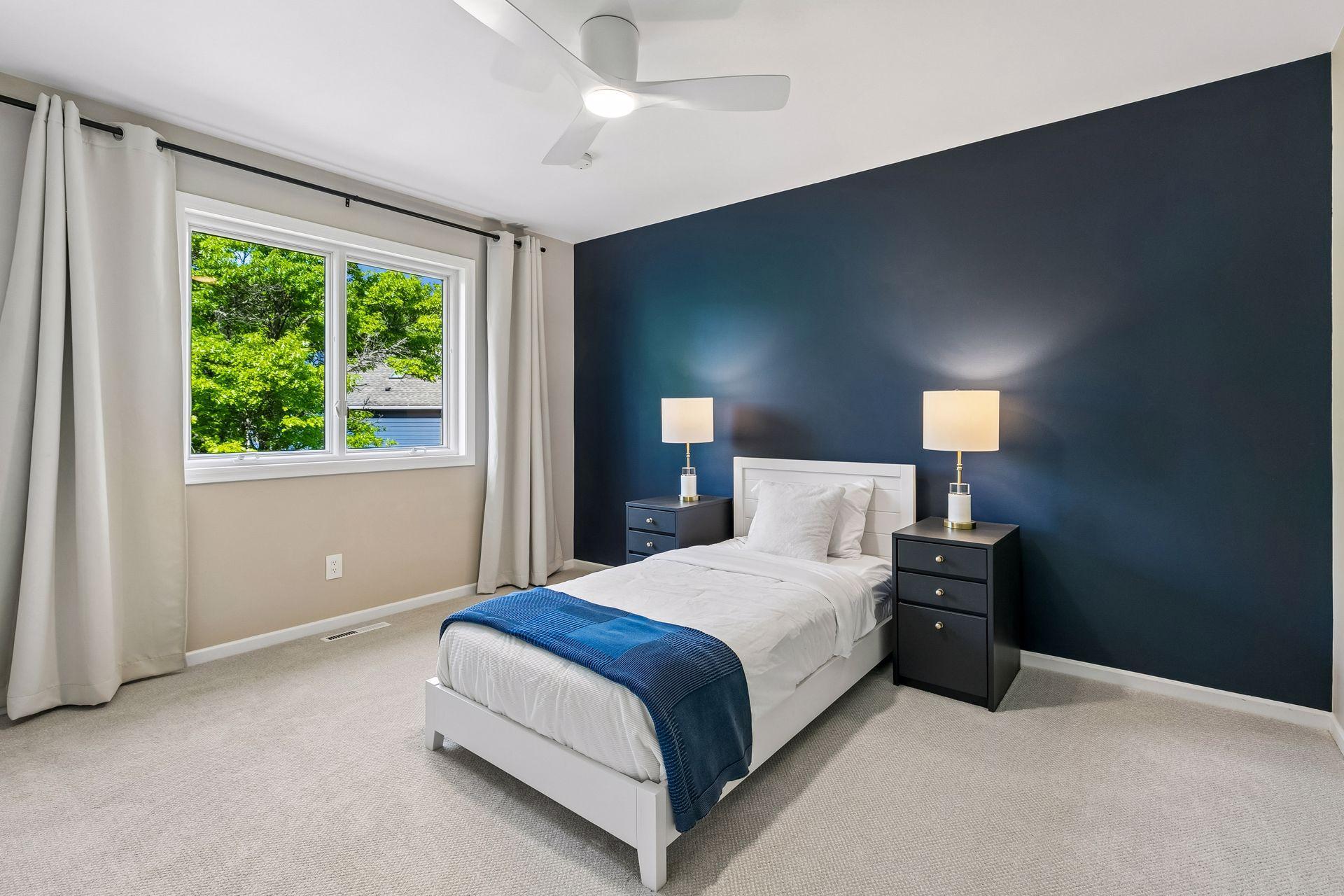 Three bedrooms on the upper level provide convenience and a functional layout for everyday living.