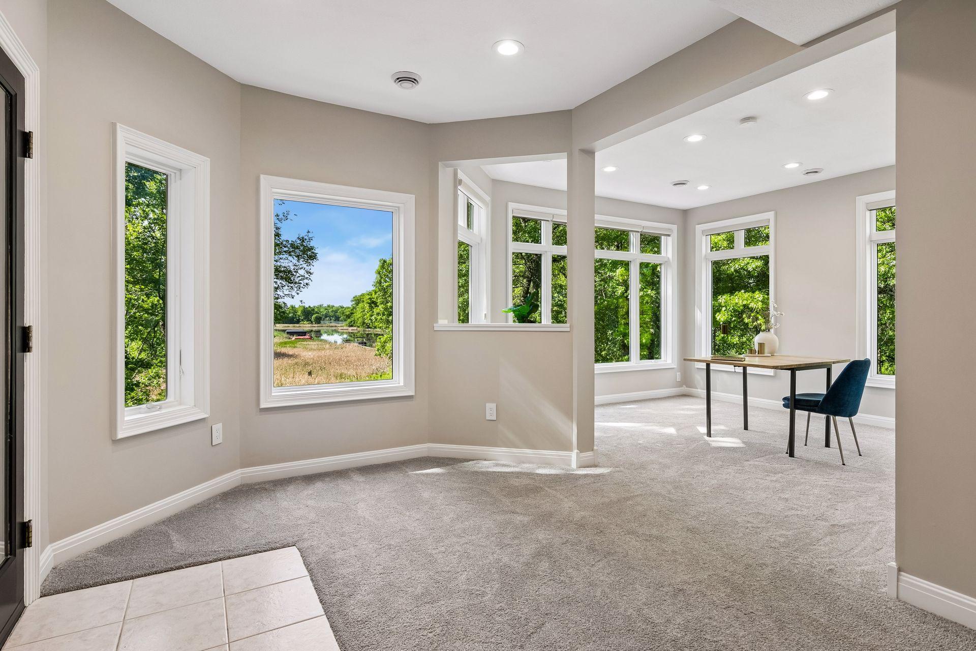 More views, more space, and more possibilities. The walkout lower level features a cozy family room with a gas fireplace and wet bar, a guest bedroom, bathroom, gym, and flexible play space that could easily be converted into an additional bedroom if
