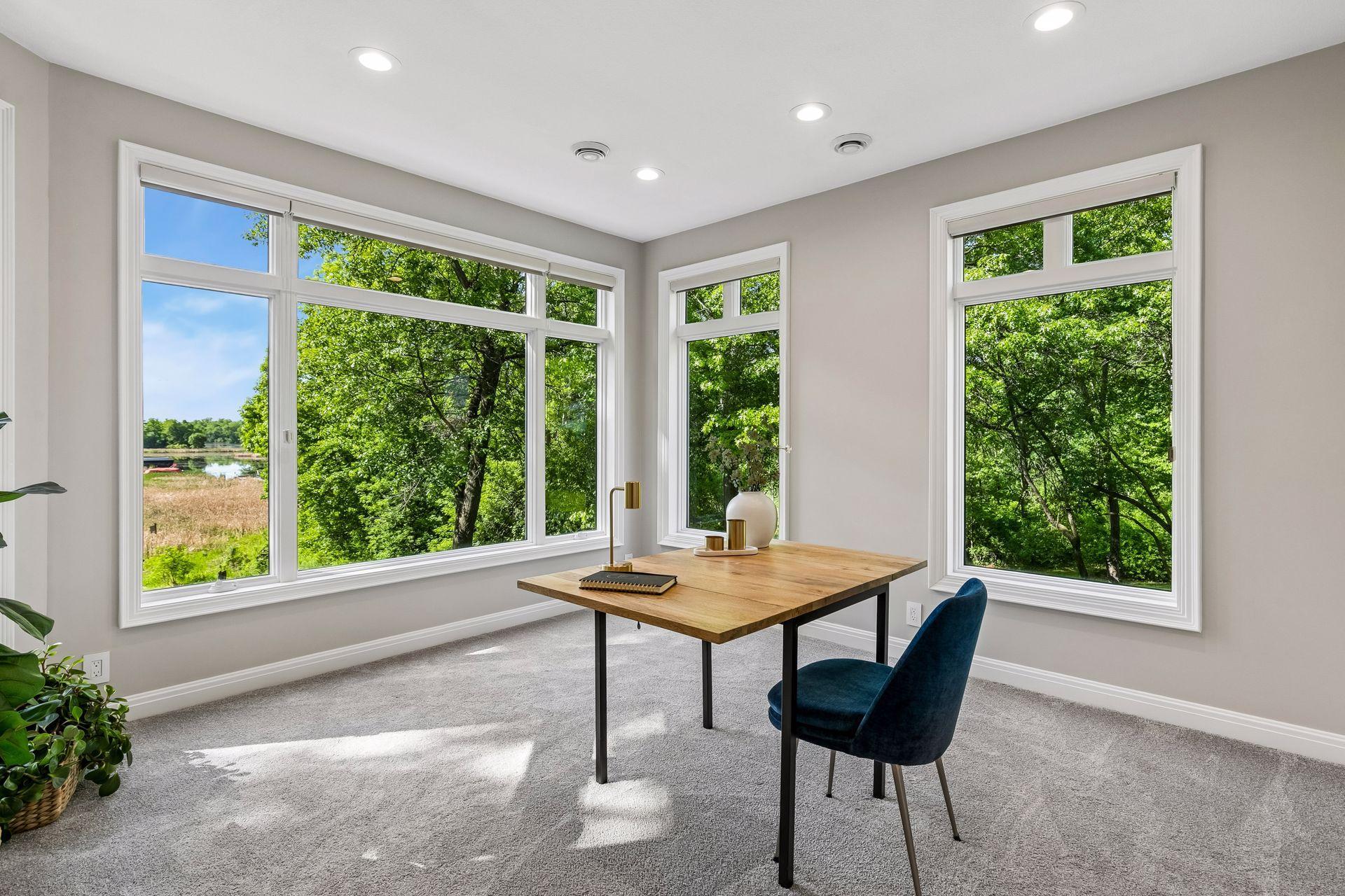 More views, more space, and more possibilities. The walkout lower level features a cozy family room with a gas fireplace and wet bar, a guest bedroom, bathroom, gym, and flexible play space that could easily be converted into an additional bedroom if