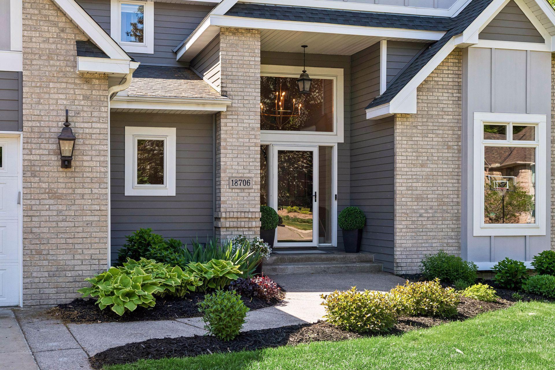 Welcome to 18706 Kanabec Court, a home designed to capture the beauty of Lake Marion from every level.