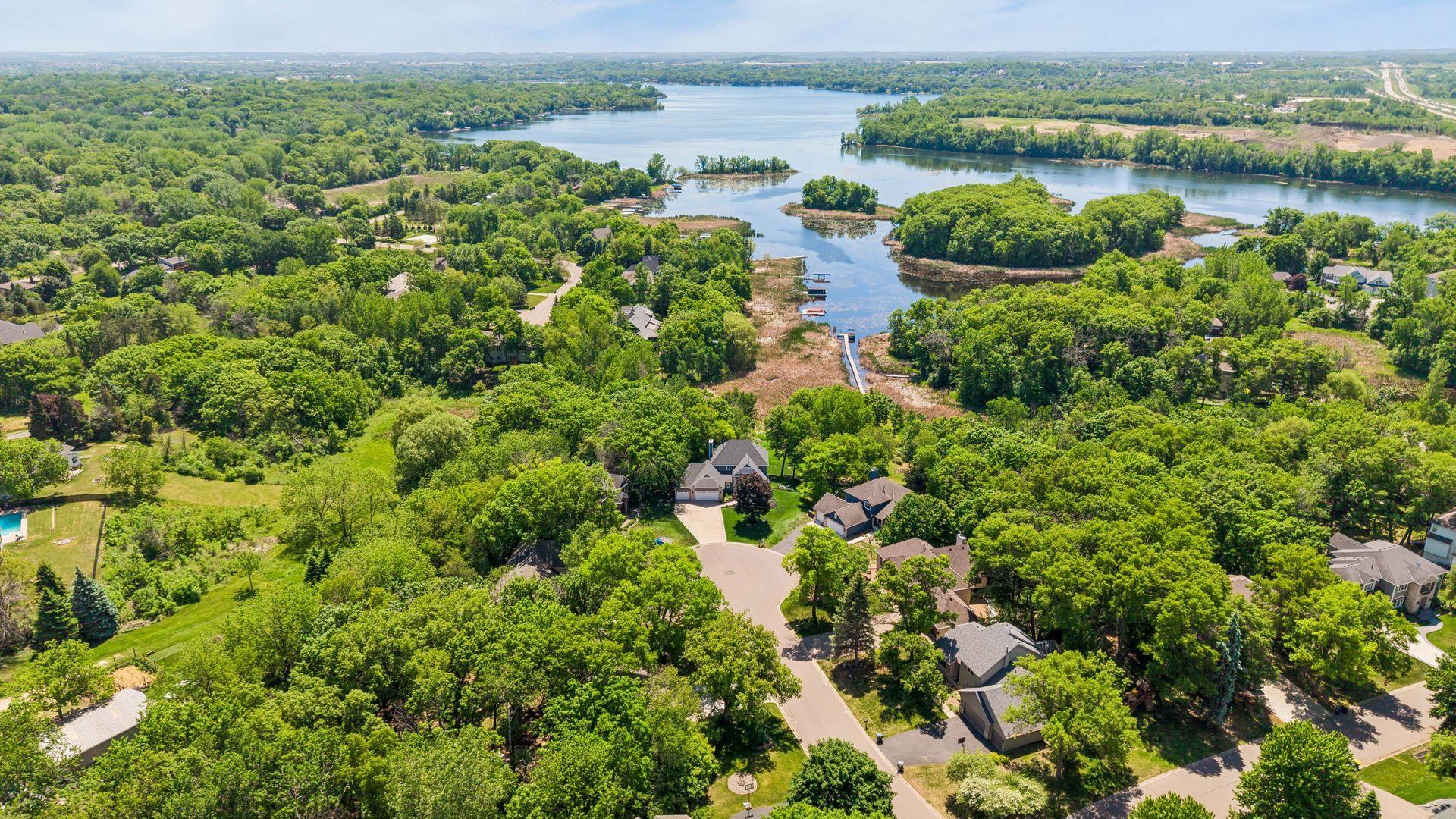 Let's check the boxes: mature neighborhood - cul-de-sac - lakefront - over an acre - close to everything - Yes, this one really does have it all.