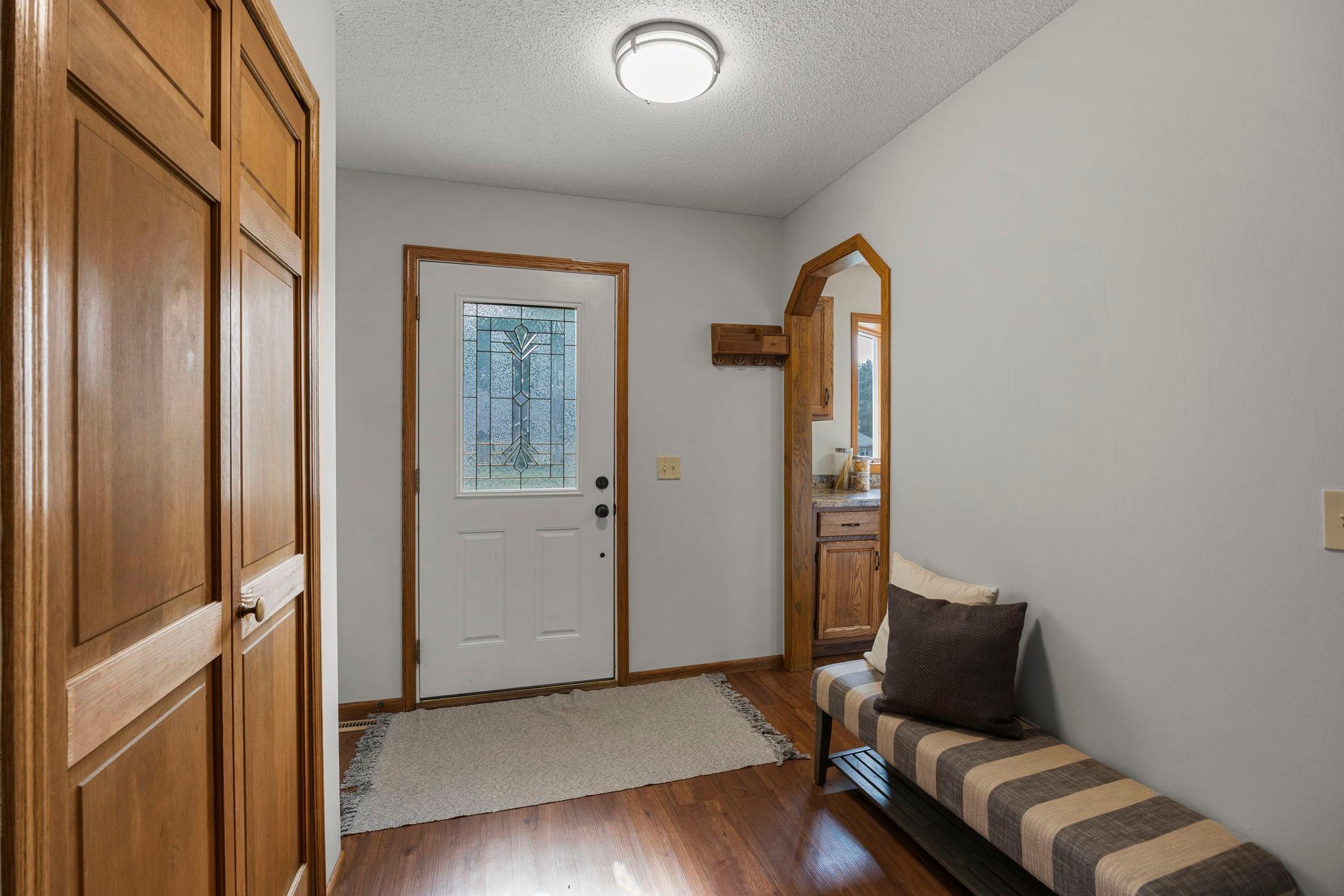 This home offers a functional layout with warm luxury plank flooring that flows seamlessly throughout the main living spaces.