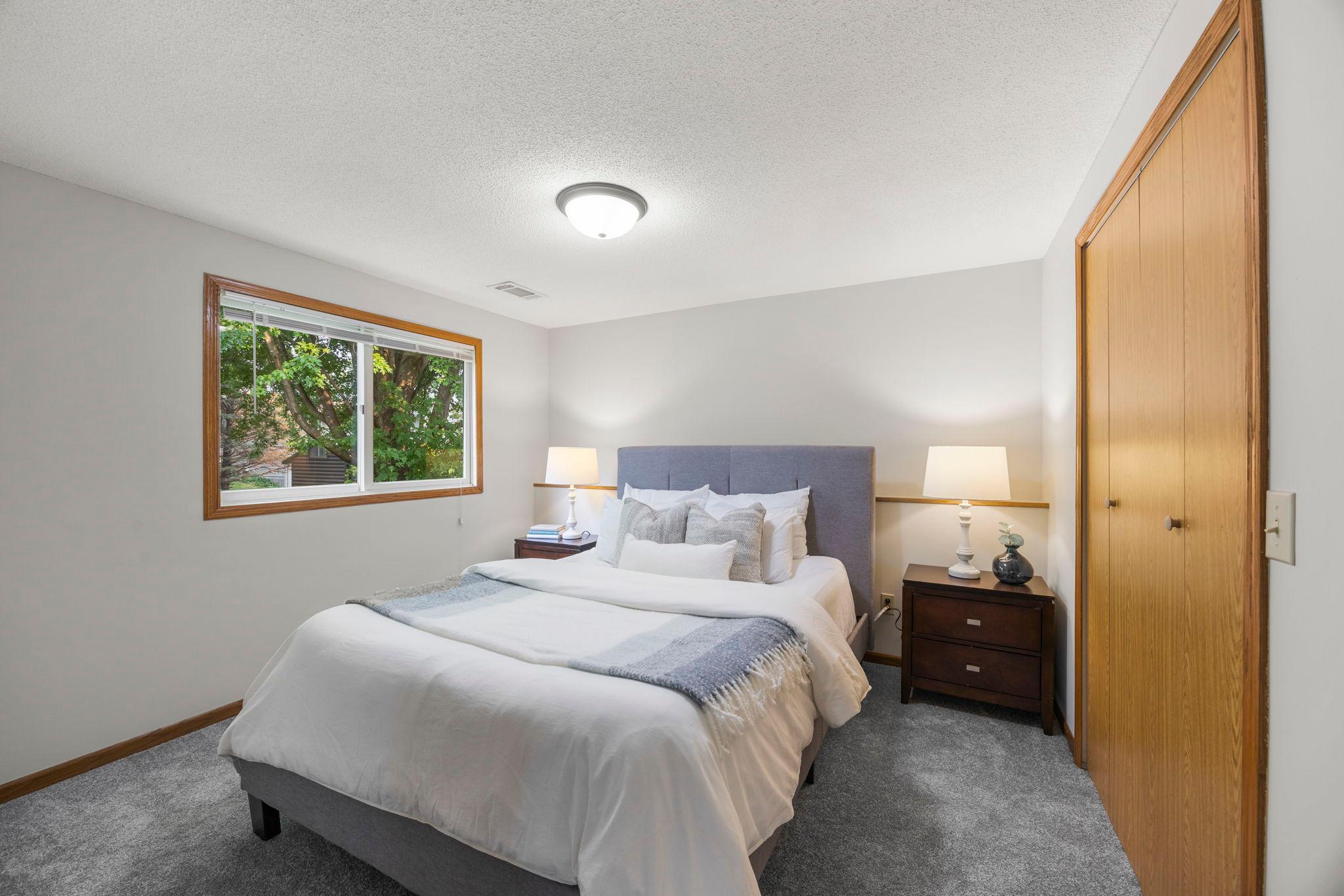 This level also includes a fourth bedroom with a lookout window.