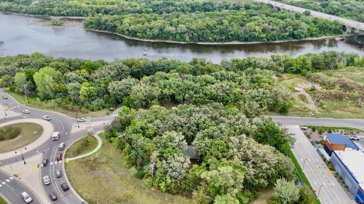 Surrounded by Mature Trees adding privacy and natural beauty.