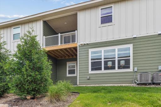 To enjoy the outside, this townhome has a covered deck off the primary bedroom, and a main level patio.