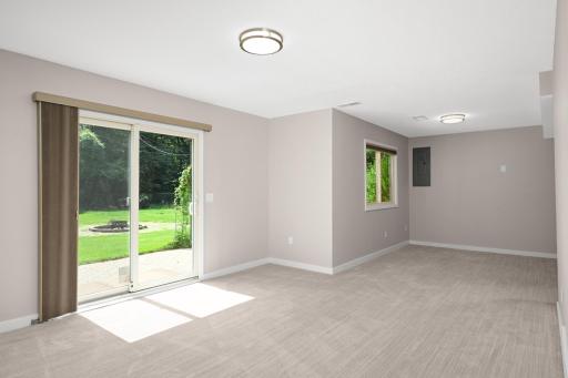 It's a walkout to the back yard. Perfect for movies and game nights.