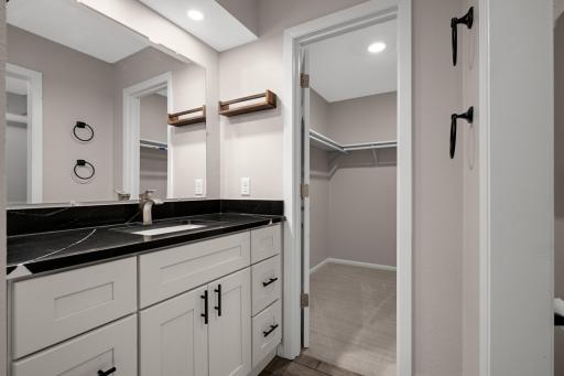 Comfort height vanity and walk-thru to the large closet.