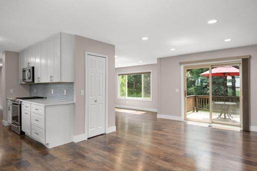 The dining room overlooks the door going out to the deck.